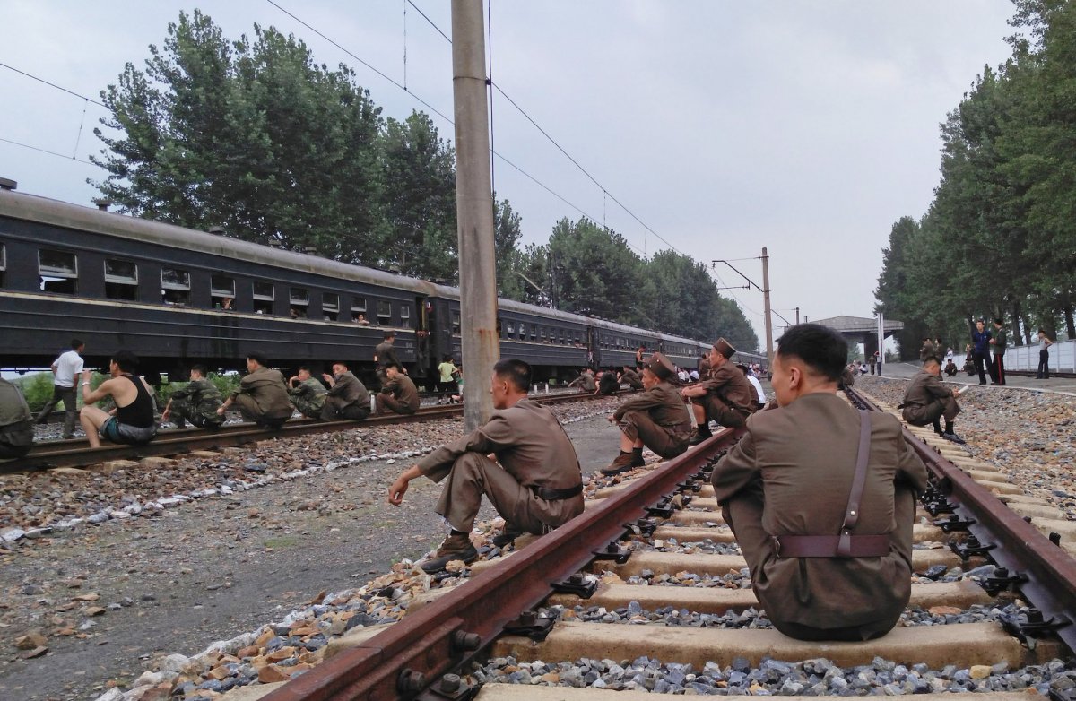 korean-peoples-army-soldiers-rested-on-the-tracks