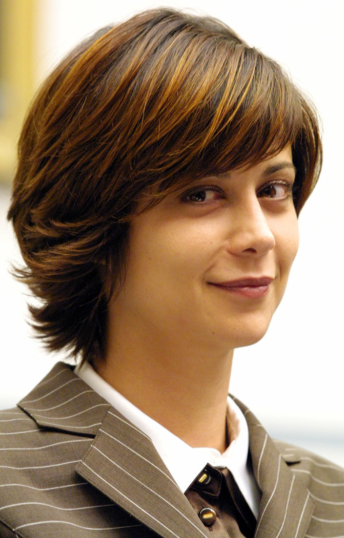 391754 03: Actress Catherine Bell smiles, during a hearing on religious discrimination in western Europe, before the House of Representatives International Operations and Human Rights Subcommittee July 11, 2001 on Capitol Hill in Washington, DC. (Photo by Alex Wong/Getty Images)