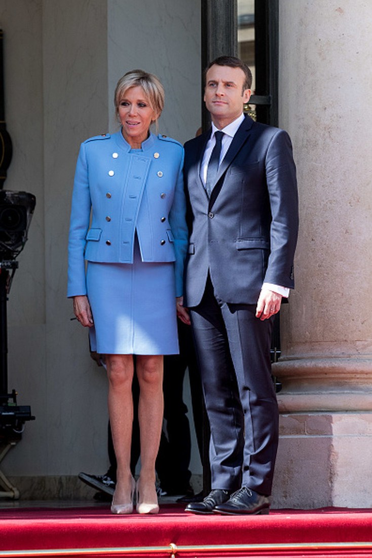 PARIS, FRANCE - MAY 14:  New French President elect Emmanuel Macron (R) and his wife, the First Lady Brigitte Trogneux (L), attend a formal ceremony as part of the transfer of power from French Former President Francois Hollande (not pictured) at the Elysee Palace on May 14, 2017 in Paris, France. Hollande and Macron spoke together for an hour in the Elysee office.  (Photo by Christophe Morin/IP3/Getty Images)