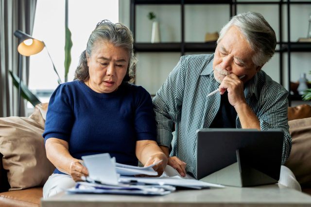 serious-stressed-asian-senior-old-couple-worried-about-bills-discuss-unpaid-bank-debt-paper-sad-poor-retired-family-looking-tablet-counting-loan-payment-worry-about-money-problem_609648-183-640x427